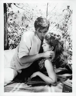 Lac0020 Prints: George Hamilton And Luana Patten In Home From The Hill
