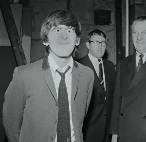 George Harrison with Eye Props