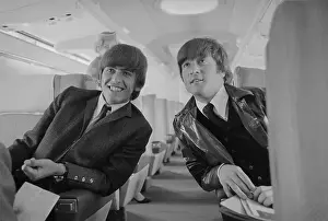 George Harrison and John Lennon Smiling