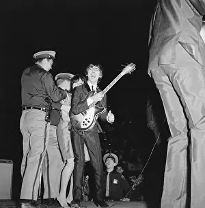 Security Guard Prints: George Harrison Mobbed by Fan During Concert