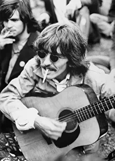 George Harrison Playing Guitar