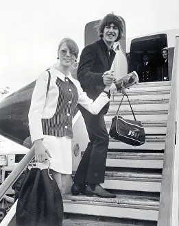 George Harrison and His Wife Patti Boyd Boarding Airplane