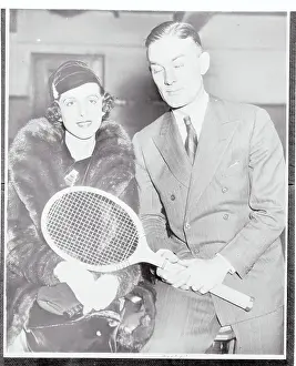 George Lott Jr. Posing With His Fiance and Holding Tennis Racket