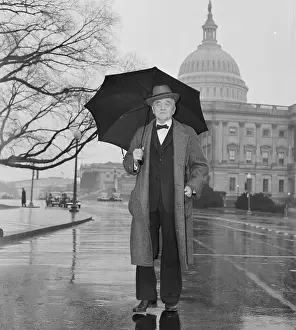 George W Prints: George Norris Walking with Umbrella