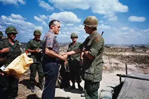 George W Prints: George Romney Shaking Hands With a Soldier
