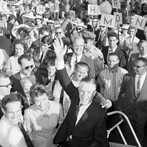 George W Prints: George Romney Waving at Head of Crowd