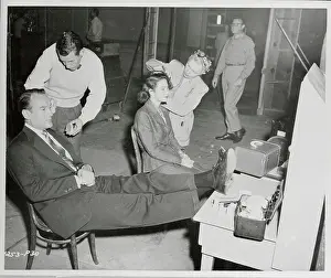George Sanders and Marta Toren Being Made Up