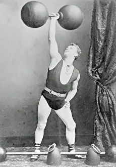 George Sandow Lifting Large Barbell
