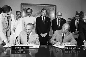 Shultz Prints: George Shultz and Sahabzaa Yagub Khan Signing an Agreement