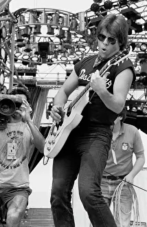 Iconic Concert Prints: Celebrate the Unforgettable Music Event That United the World: George Thorogood Performs At Live Aid