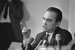 George Wallace Sitting at Microphones