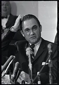 George Wallace Standing at Microphones