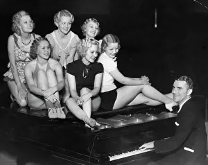 George White Playing Piano in Scandals