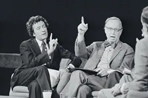 Gerald Rafsnoon and Arthur M. Schlesinger Raising Hands