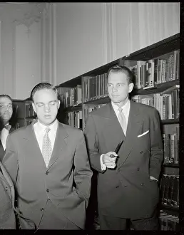 Frankfurt Prints: Gerard Shine and Roy Cohn with Others Near Bookshelf