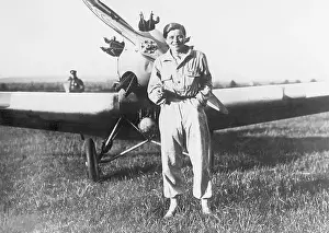 German Aviator in Front of Her Plane