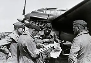 Bombing Prints: German Officers Ready For Bombing Flight
