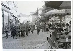 German Tourists Walk Through Paris