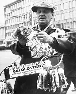 Ticket Prints: German Vendor Selling Lottery Tickets