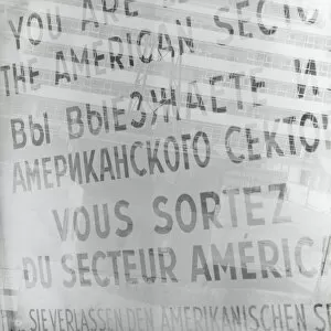 Berlin Wall (Antifascistischer Schutzwall) Collection: Germany, West Berlin, Checkpoint Charlie sign (B&W)