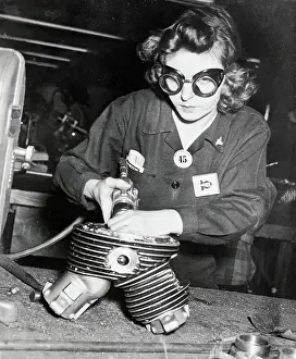Gertrude Shenthle Working on an Airplane Cylinder