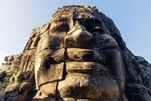 Giant carved stone faces, Bayon temple, Angkor