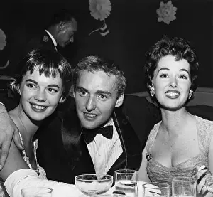 Prints of American actors (left to right) Natalie Wood (1938 - 1981) Dennis Hopper (1936 - 2010) and Barbara Rush at the Mocambo nightclub after the premiere of Giant, West Hollywood, California Grace, Glamour & Timeless Elegance: Giant Premiere