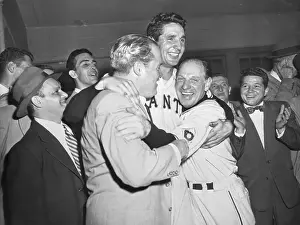 Giants Manager and Owner Hug Pitcher After Winning Pennant