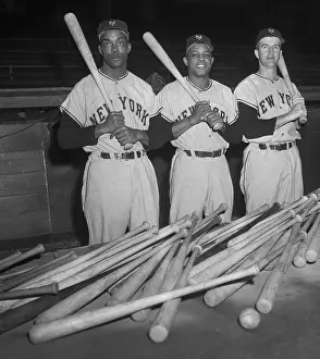 Giants Outfielders Posing by Baseball Bat Collection