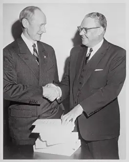 Gilbert Mueller and Henderson Supplee Shaking Hands
