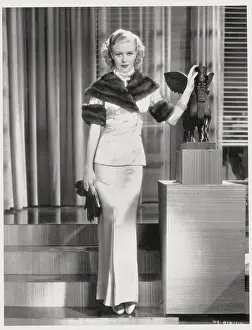 Ginger Rogers Modeling Evening Suit