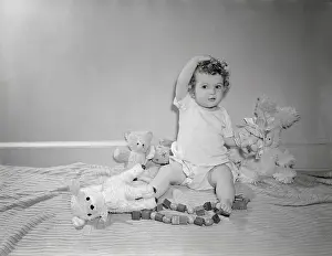 2 3 Years Prints: Girl (2-3) playing with toys
