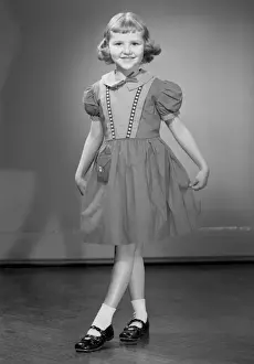 Posture Prints: Girl (6-7) wearing dress, portrait