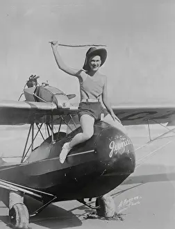 Girl Atop a Plane
