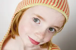 Eight To Ten Prints: Girl, child, red hair, hooded shirt, portrait