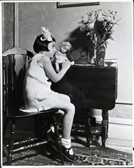 Girl and Doll Listening to Radio