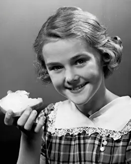 Girl eating bread