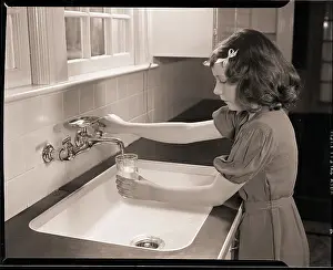 Filling Prints: Girl Filling Glass with Water