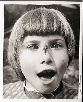 Eyes Crossed Prints: Girl with Grasshopper on Her Nose