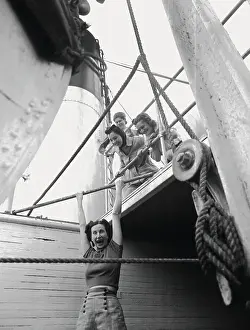 Girl Hanging on Bar