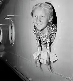 Girl With Her Head Out Of Porthole