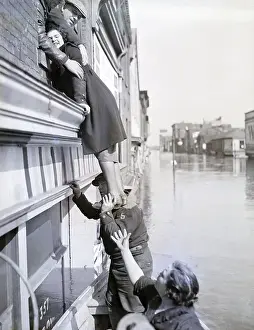 Flood Prints: Girl Being Helped From Building; Flood