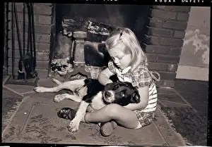 Coal Prints: Girl Holding Dog