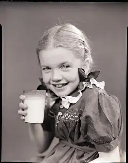Milk Prints: Girl Holding a Glass of Milk