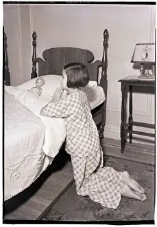 Girl Kneeling at Bed Praying