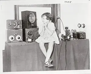 Girl Listening to a Radio