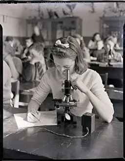 Class Prints: Girl Looking into Microscope