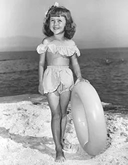 Suits Prints: Girl Models Bathing Suit At Beach