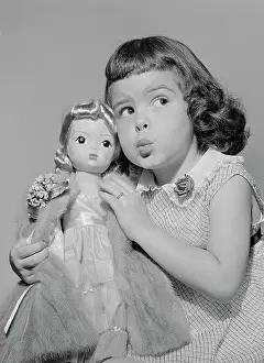 Mink Prints: Girl Playing with Doll Wearing Real Mink Coat