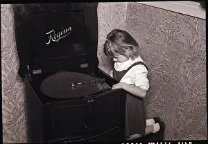 Disc Prints: Girl Playing with Large Music Box